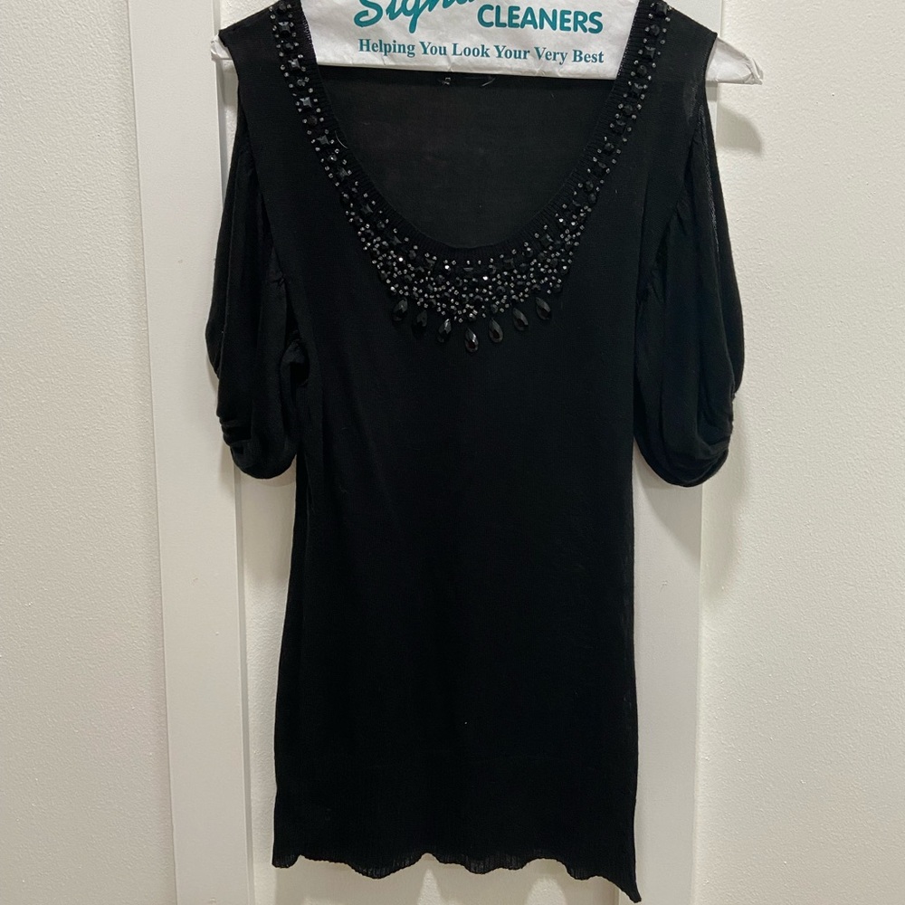 Black beaded neckline top with cuffed waist and sleeves